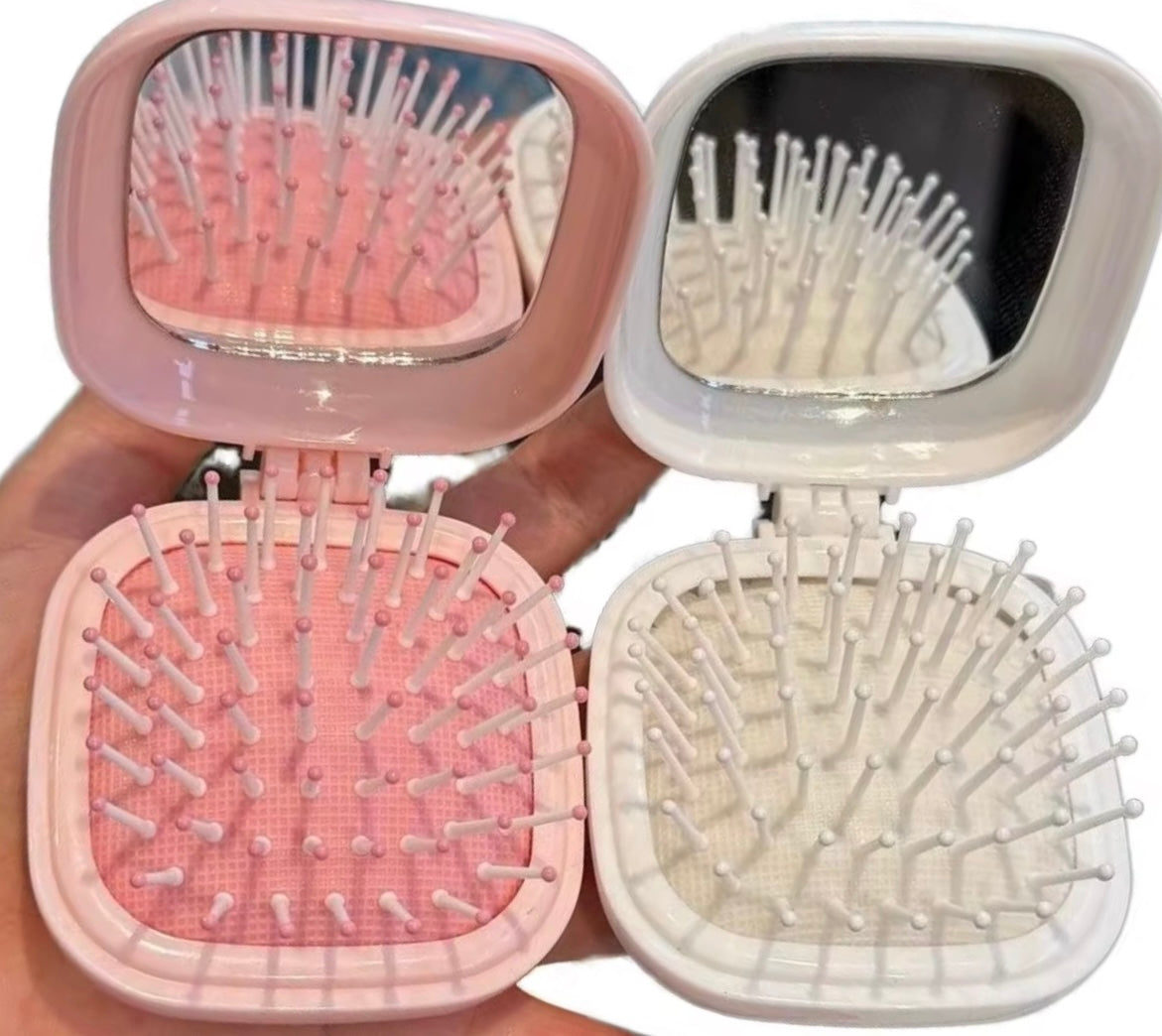 Brosse à cheveux miroir intégré